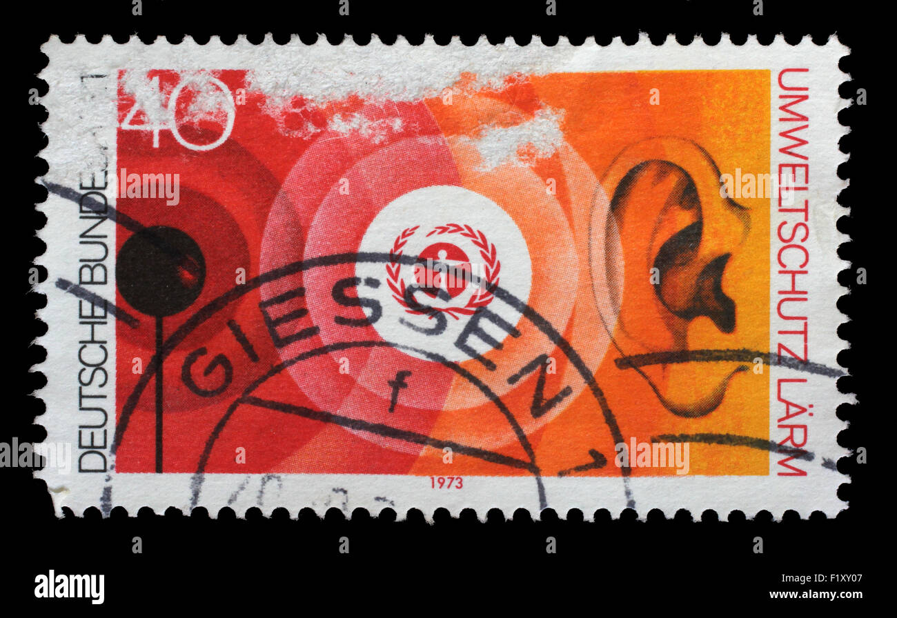 Un timbre imprimé dans l'Allemagne montre l'emblème de l'environnement et la pollution sonore, de la nature et de protection de l'environnement, vers 1973 Banque D'Images