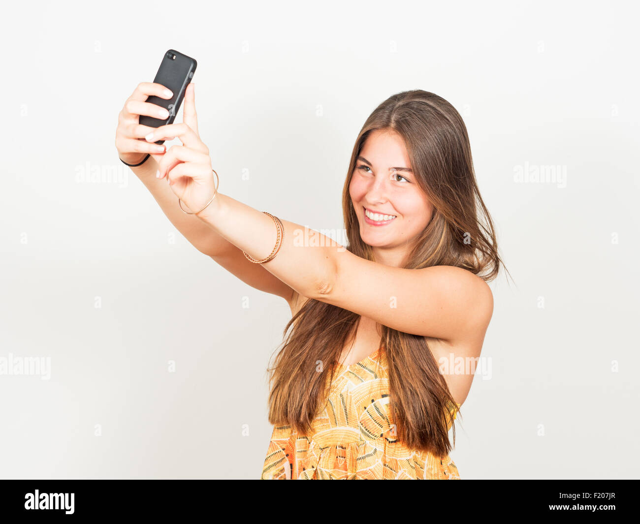 Macht ein junge Frau Selfies attraktive Banque D'Images