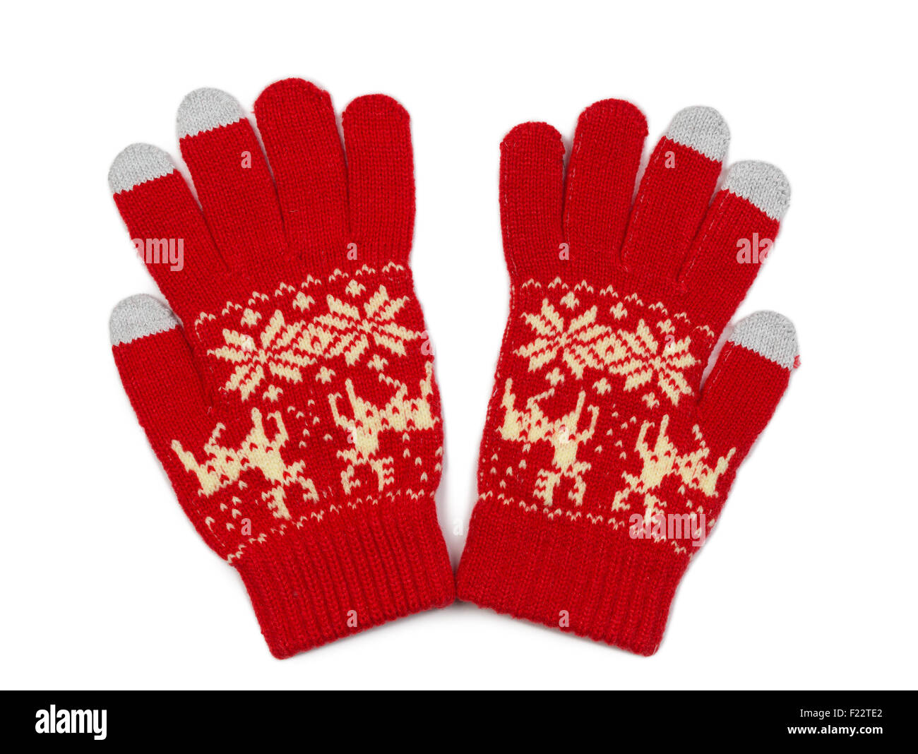 Gants tricot rouge avec motif flocons de neige et le renne. Avec les inserts pour l'affichage à l'écran. Isoler sur blanc. Banque D'Images