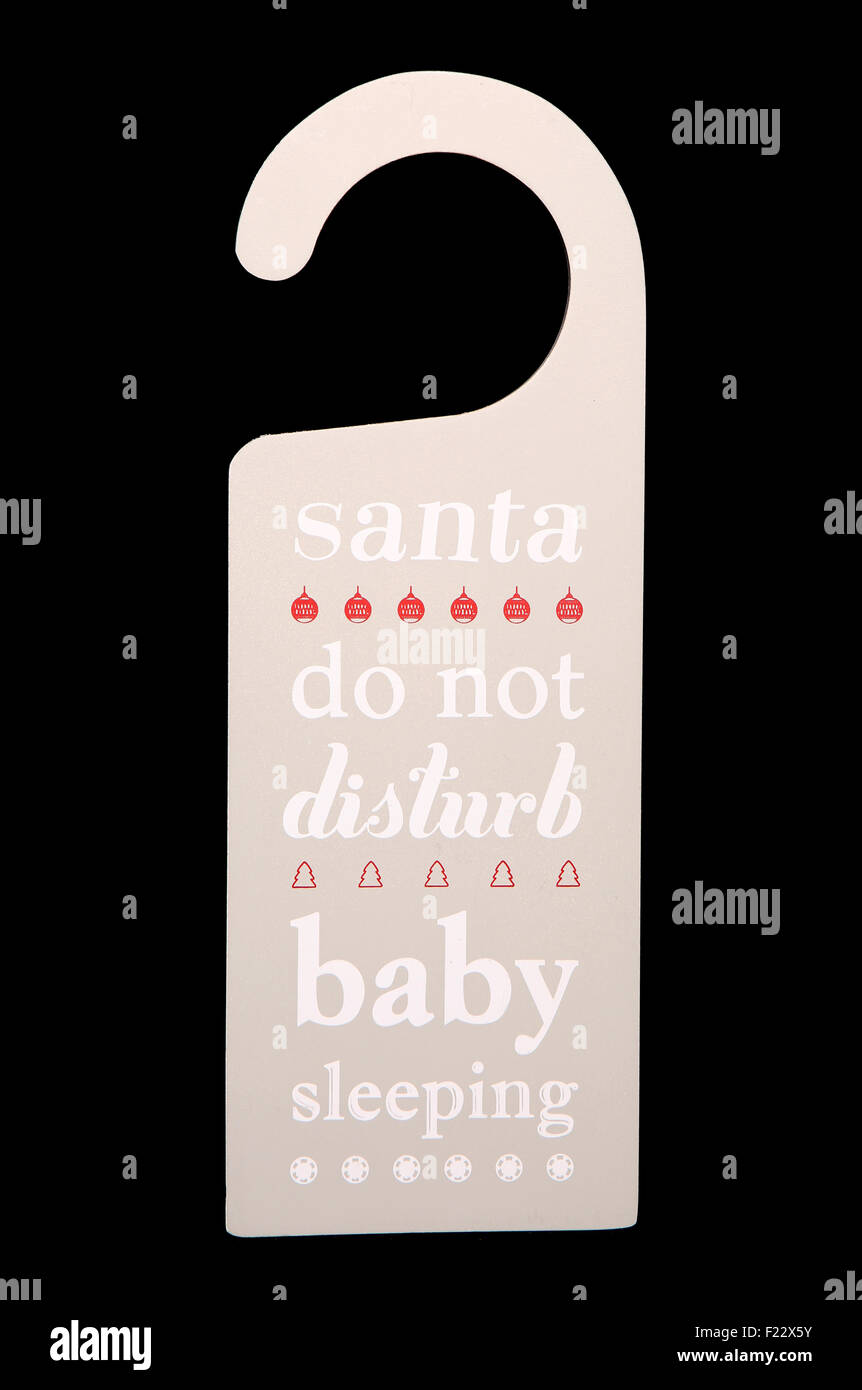 Affichette de porte bébé noël découpe couchage Banque D'Images