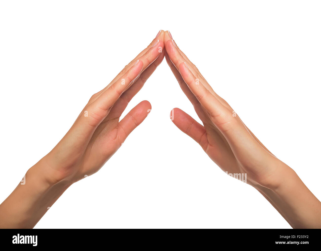 Les mains des femmes comme toit. Banque D'Images