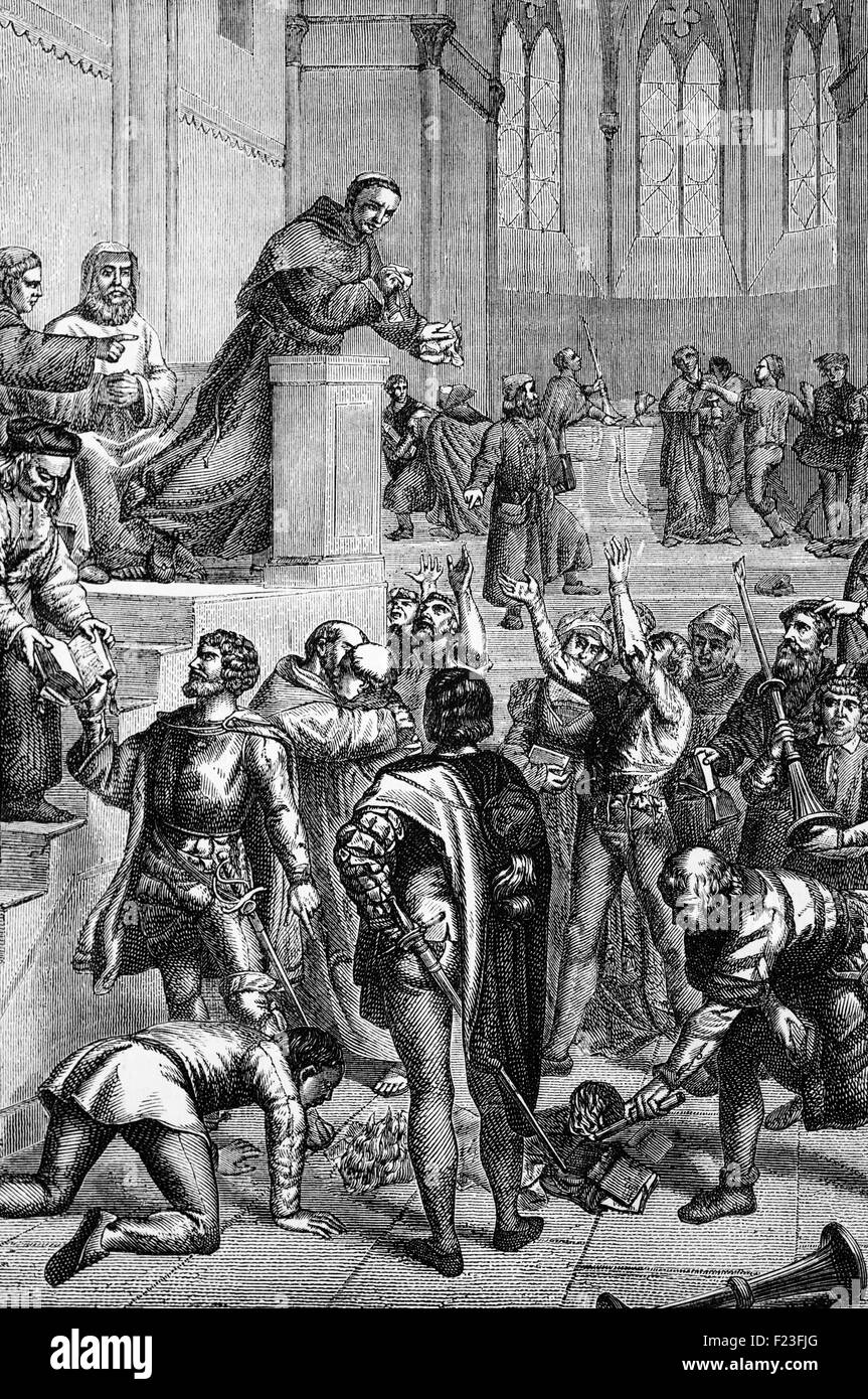 Martin Luther dénonçant le rituel catholique romain après l'affichage de ses 95 thèses dans l'église du château de Wittenberg, le Land de Saxe-Anhalt, en Allemagne, en 1517. Banque D'Images