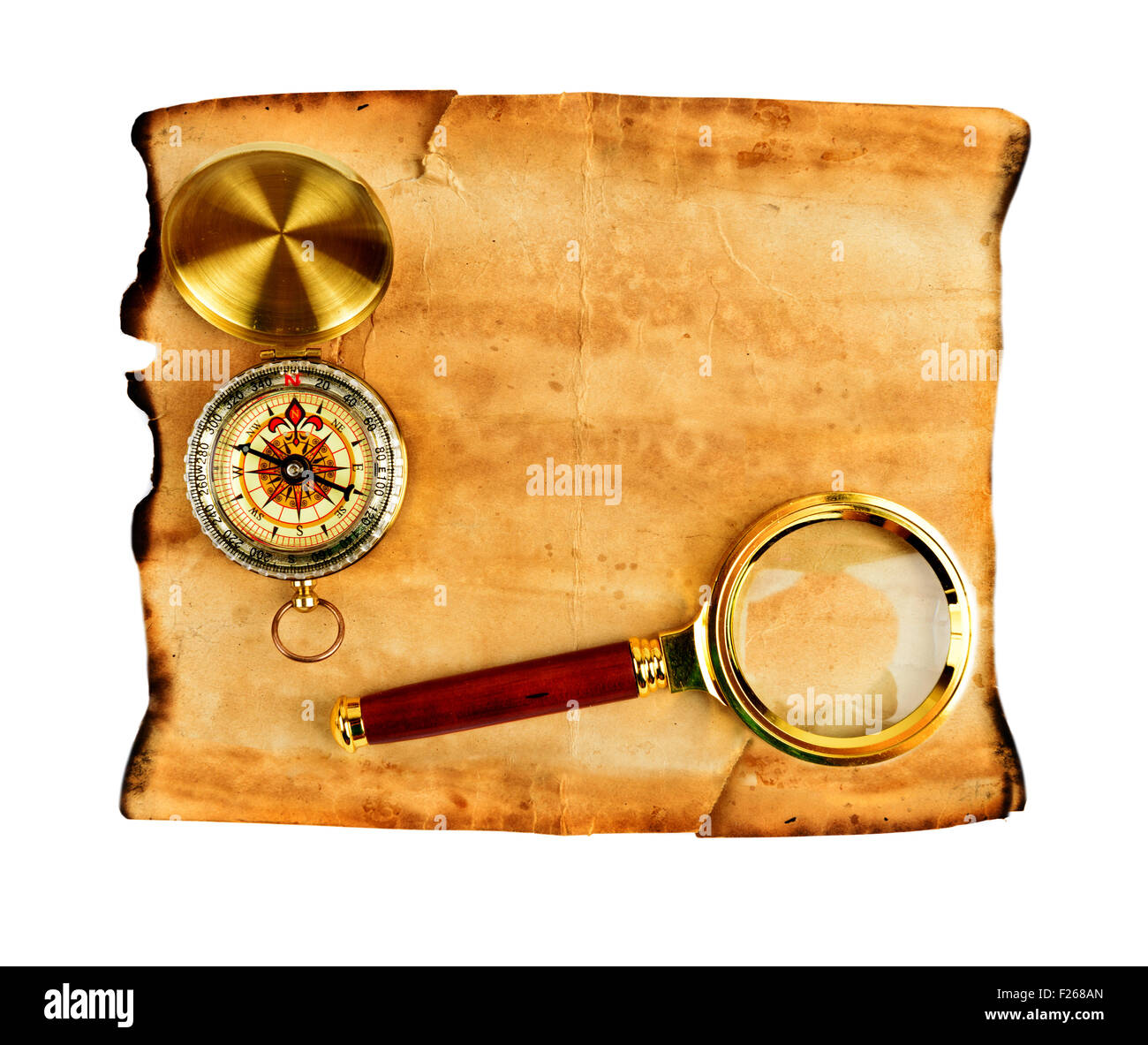 Boussole sur vieux papier texturé avec copyspace Banque D'Images