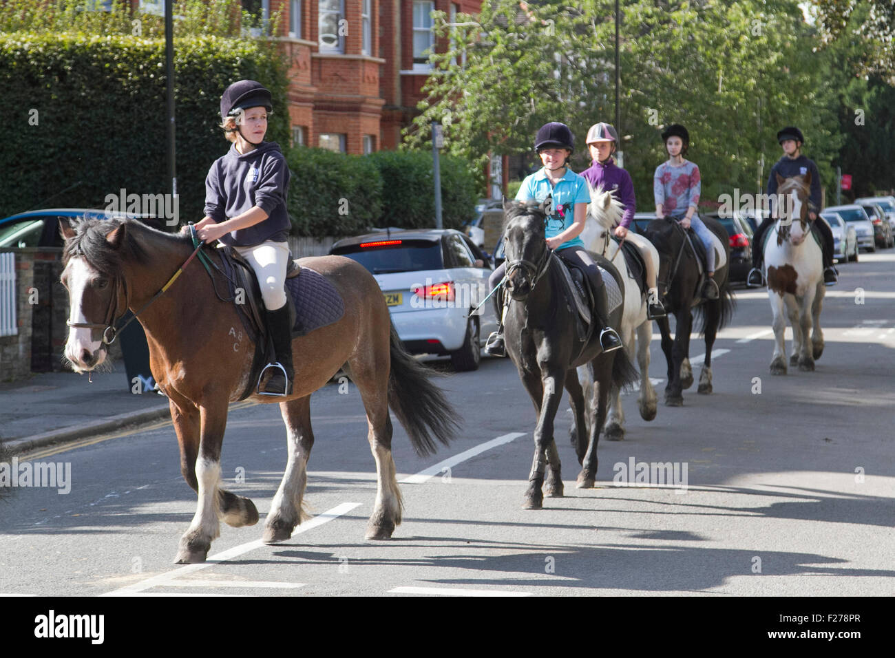 Wimbledon London,UK. 12 septembre 2015. Un groupe de cavaliers sur une chaude journée ensoleillée à Wimbledon London Crédit : amer ghazzal/Alamy Live News Banque D'Images