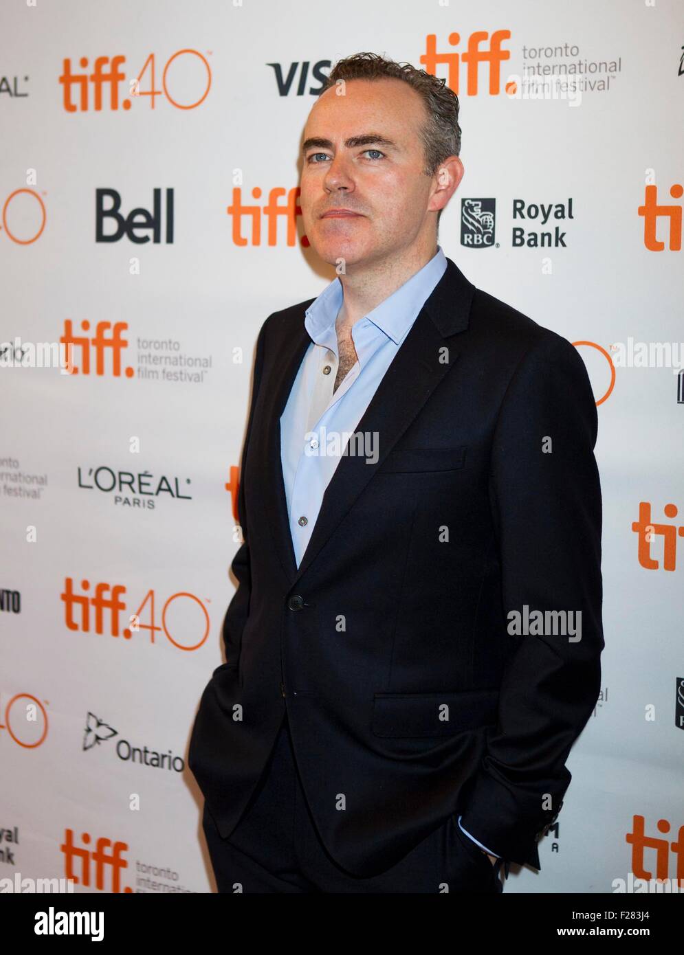 Toronto, Canada. 13 Sep, 2015. Le réalisateur John Crowley pose pour photos avant la première Canadienne de film 'Brooklyn' au Winter Garden Theatre lors de la 40e Festival International du Film de Toronto à Toronto, Canada, le 13 septembre 2015. Credit : Zou Zheng/Xinhua/Alamy Live News Banque D'Images