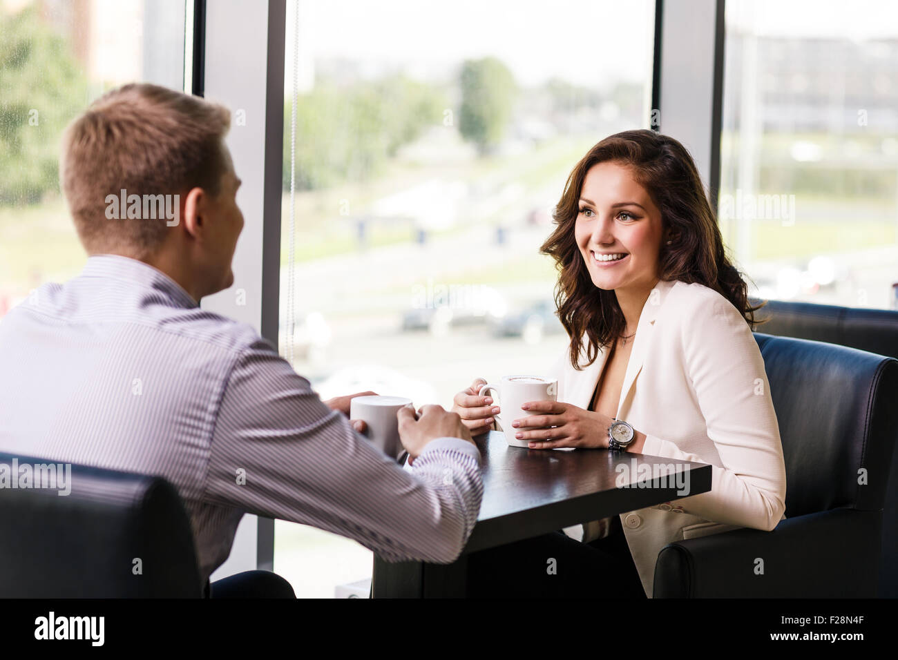 Couple enjoying coffee Banque D'Images