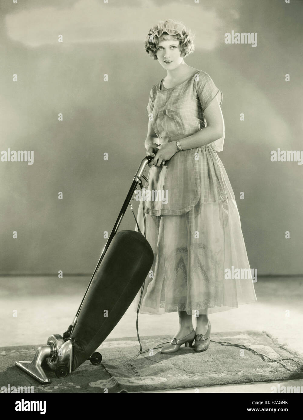 Tapis à l'aspirateur (OLVI femme008 OU F085) Banque D'Images