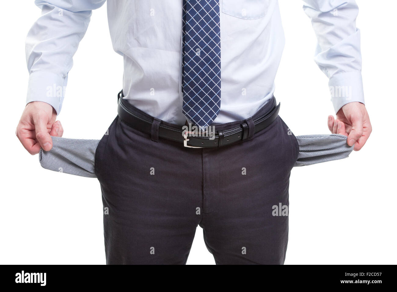 A business man avec poches vides isolated on white Banque D'Images