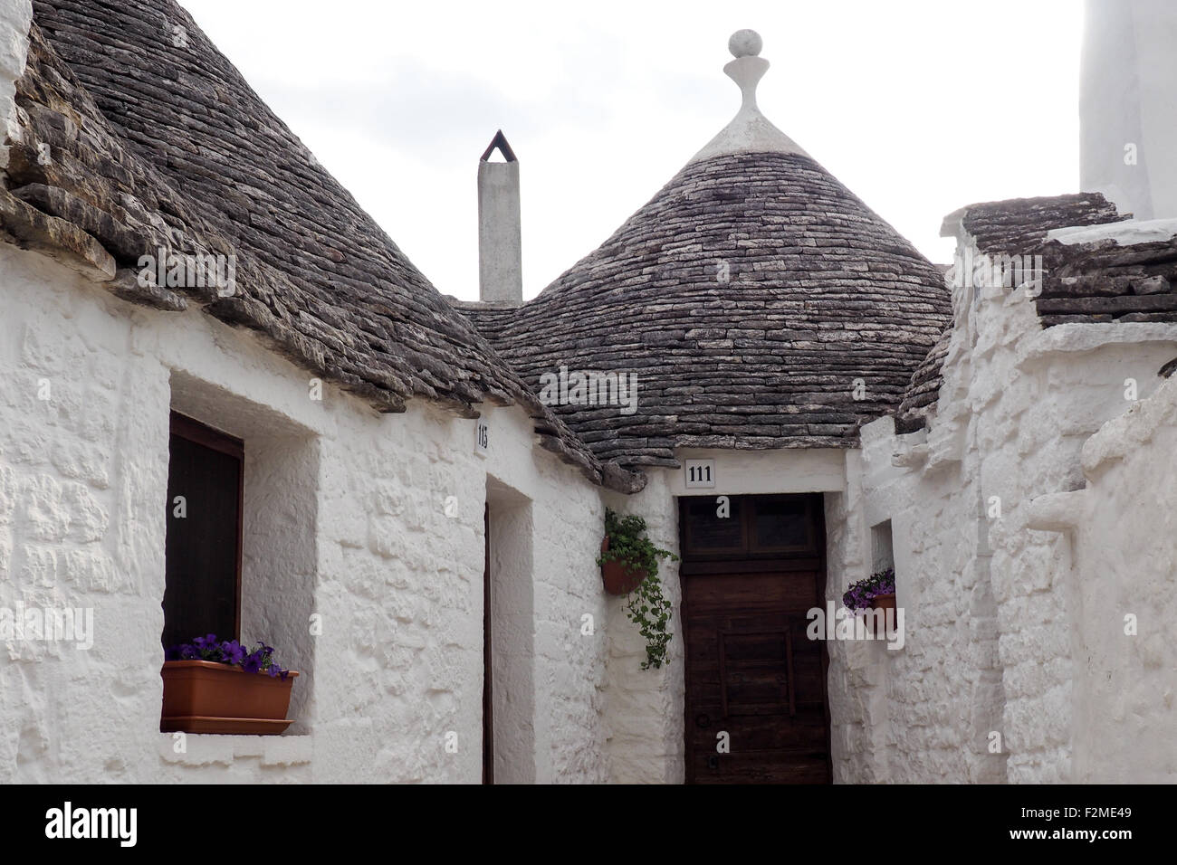 Entrée d'un trullo maison dans le quartier de Monti, l'Alberobello. Banque D'Images