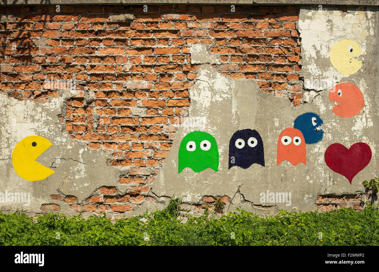 Vieux jeu d'arcade, peint sur un mur. Banque D'Images