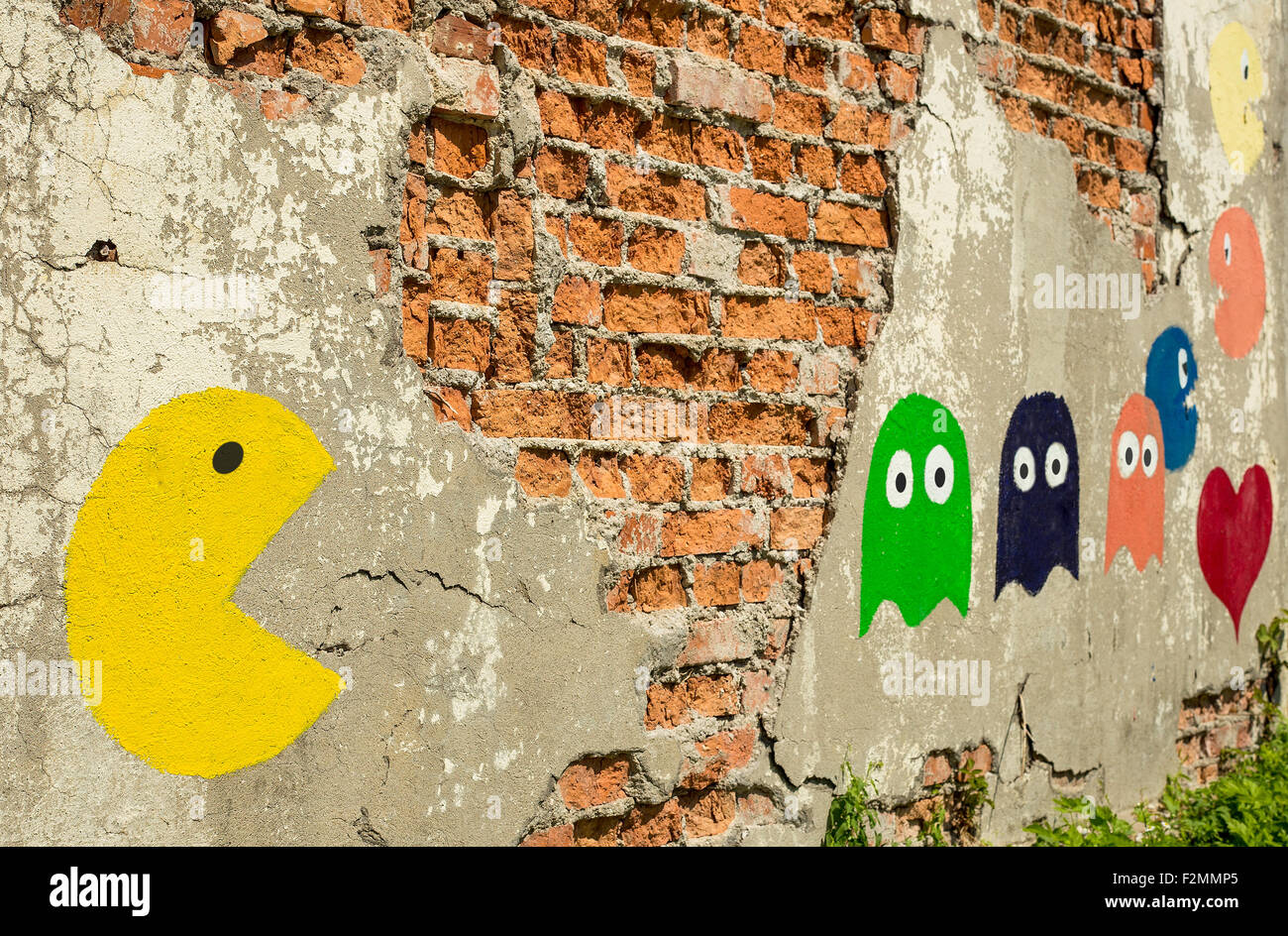 Vieux jeu d'arcade, peint sur un mur. Banque D'Images