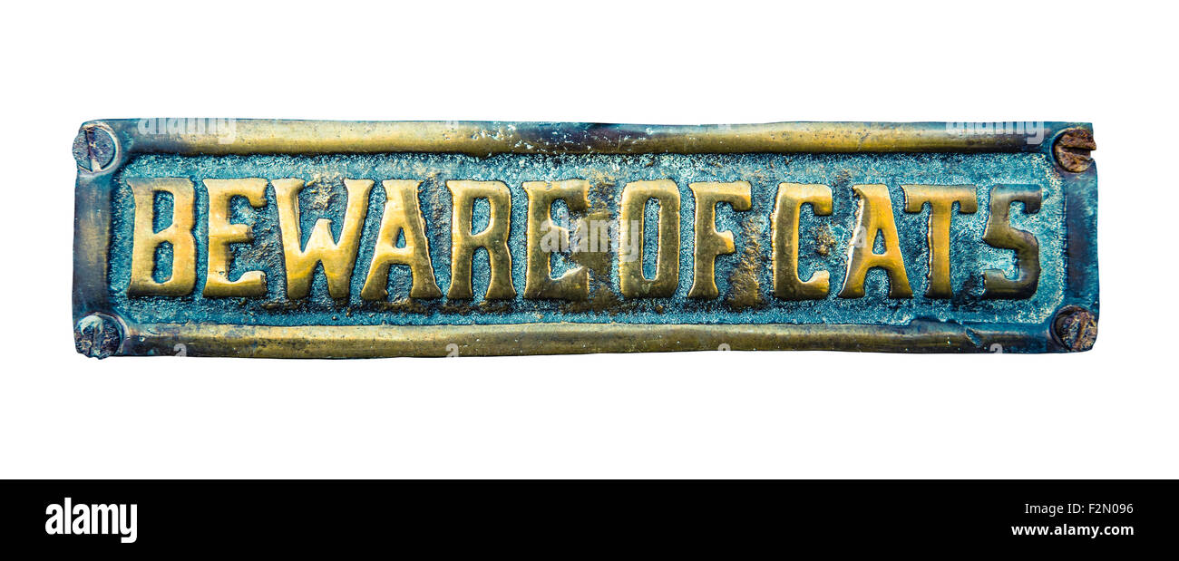 Méfiez-vous des chats en laiton Funny Sign pour porte Banque D'Images