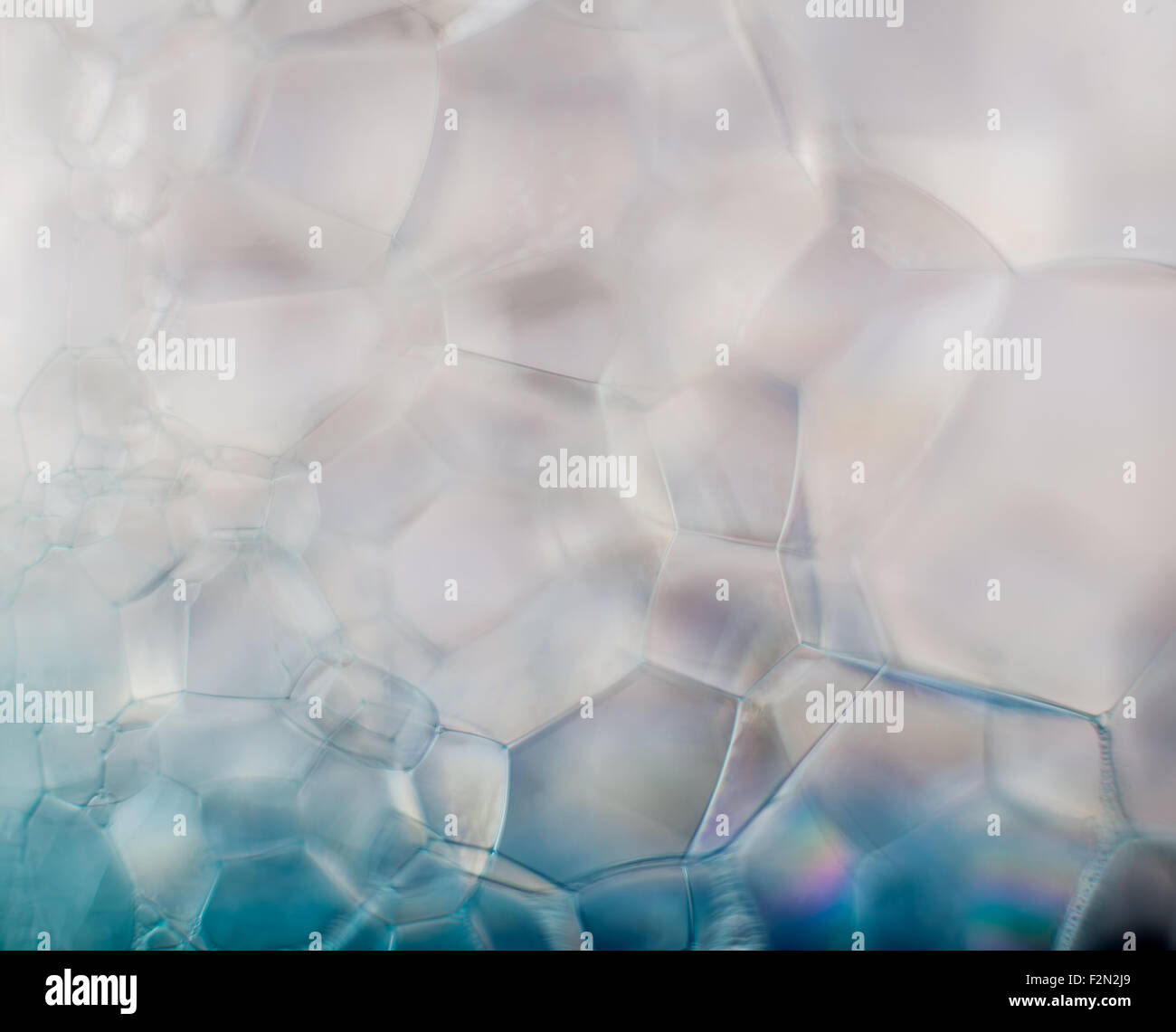 Résumé fond brumeux de rêve - de l'eau savonneuse en bleu macro Banque D'Images