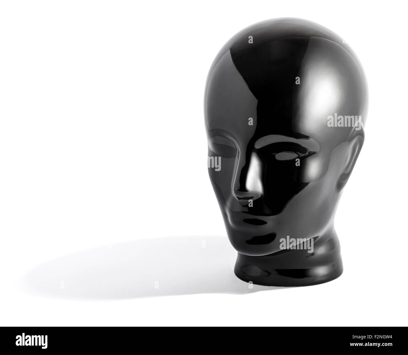 La vie toujours noir brillant de mannequin sans relief Statue face contre fond blanc en studio with Copy Space Banque D'Images