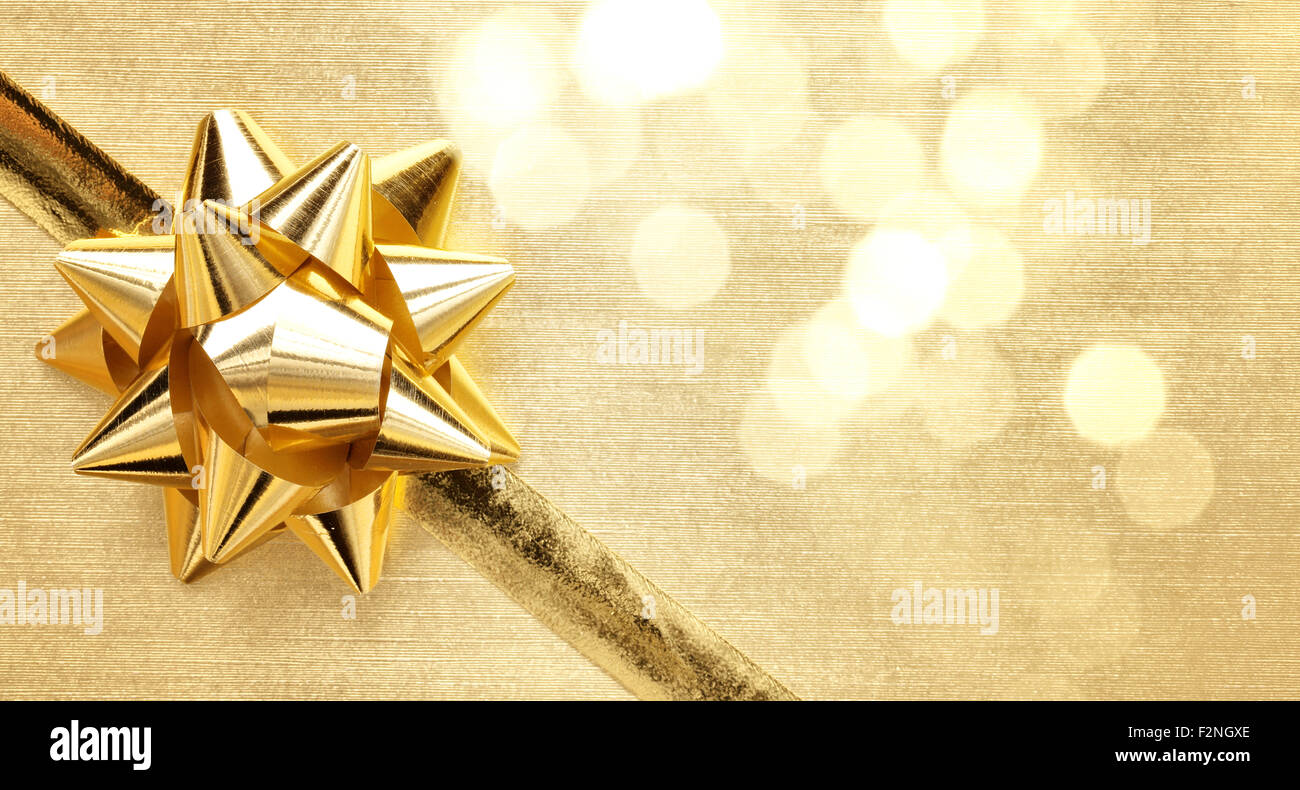 Golden ribbon bow avec bokeh,décoration de Noël. Banque D'Images