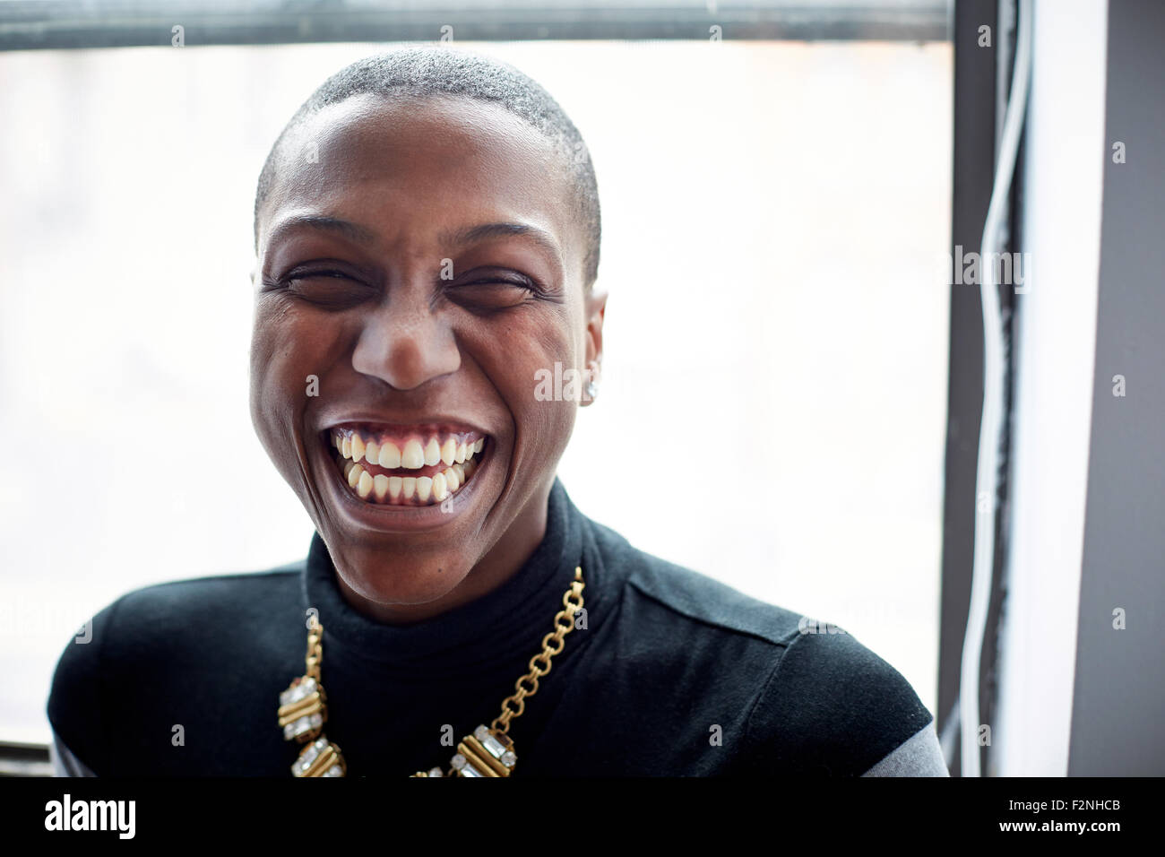 Close up of mixed race woman laughing, Banque D'Images