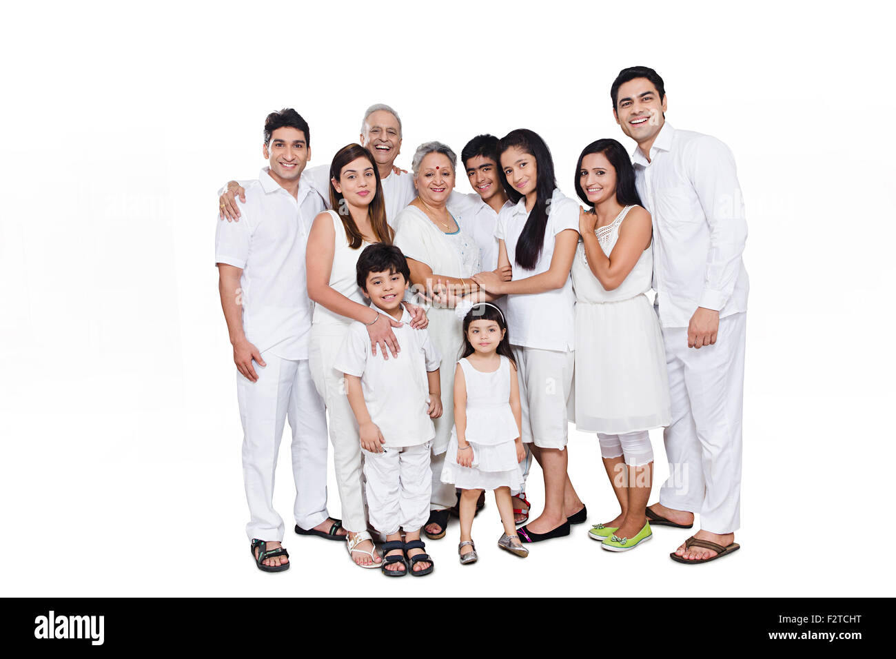 Groupe indien famille mixte profiter permanent Banque D'Images