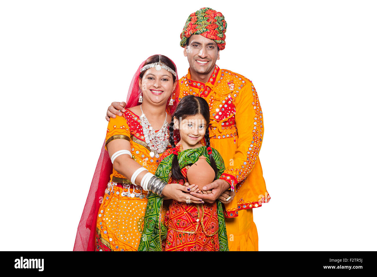3 Les parents et les villageois du Rajasthan indien fille Tirelire d'économiser de l'argent Banque D'Images