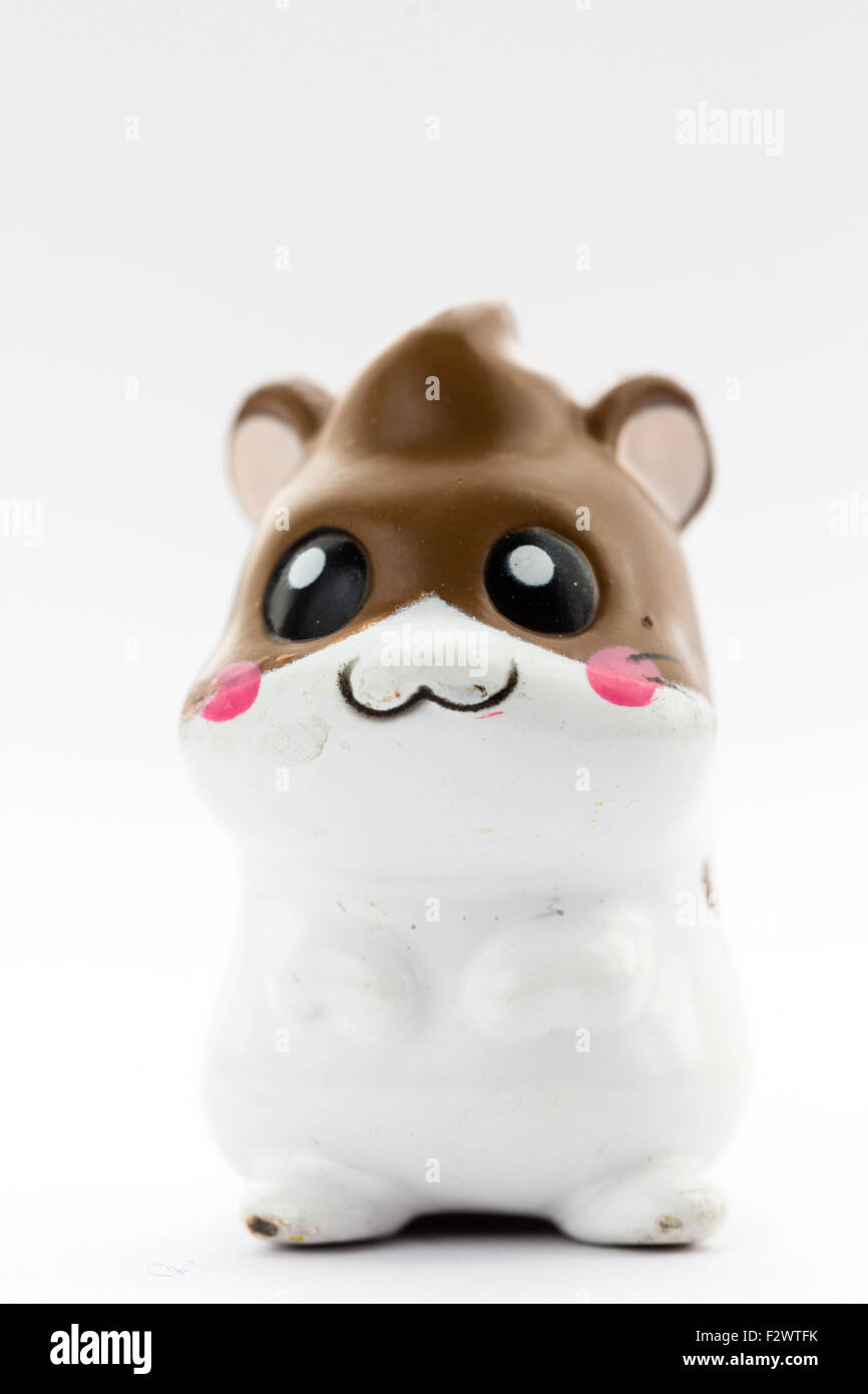 Hamster Hamtaro plastique japonais personnage du Ham-Ham gang, hamster. Les chiffres d'anime. Anime figure à l'arrière-plan blanc. Banque D'Images