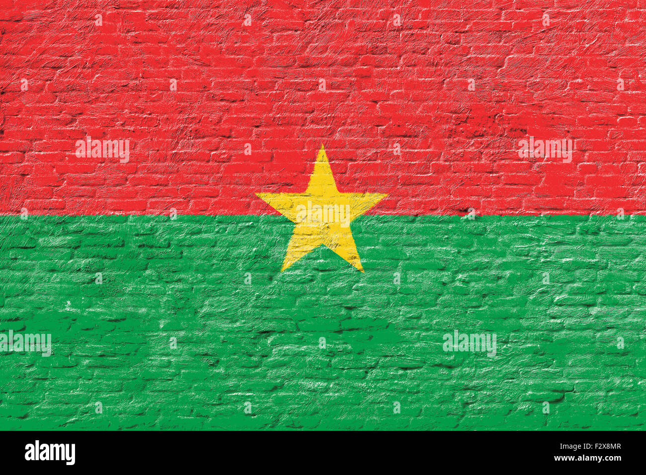 Burkina Faso - drapeau national sur mur de brique Banque D'Images