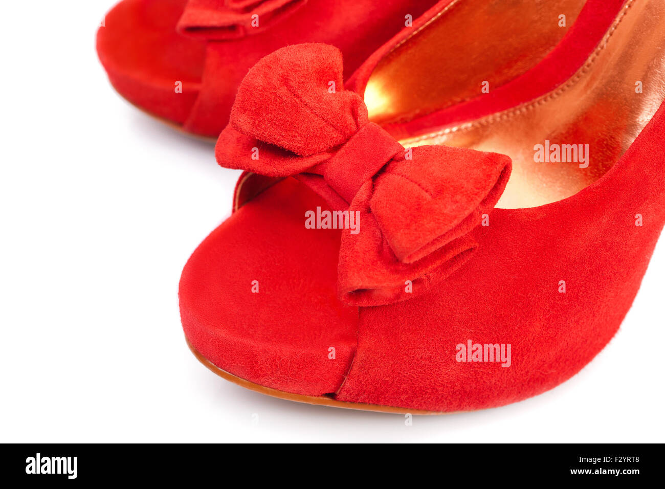 Paire de chaussures femme rouge sur fond blanc Banque D'Images