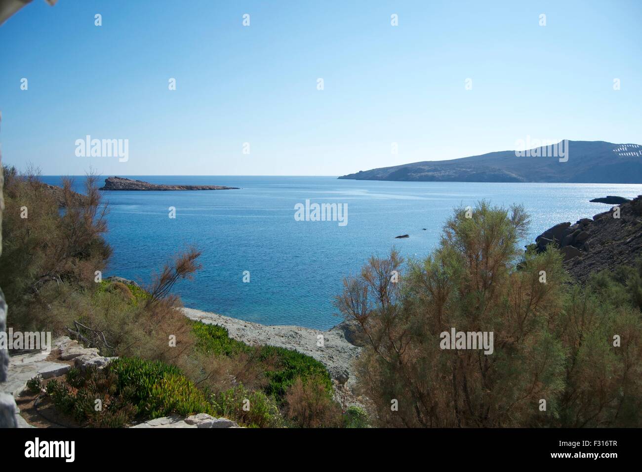 L'île de Mykonos Grèce plage eau de mer bleu clair Banque D'Images