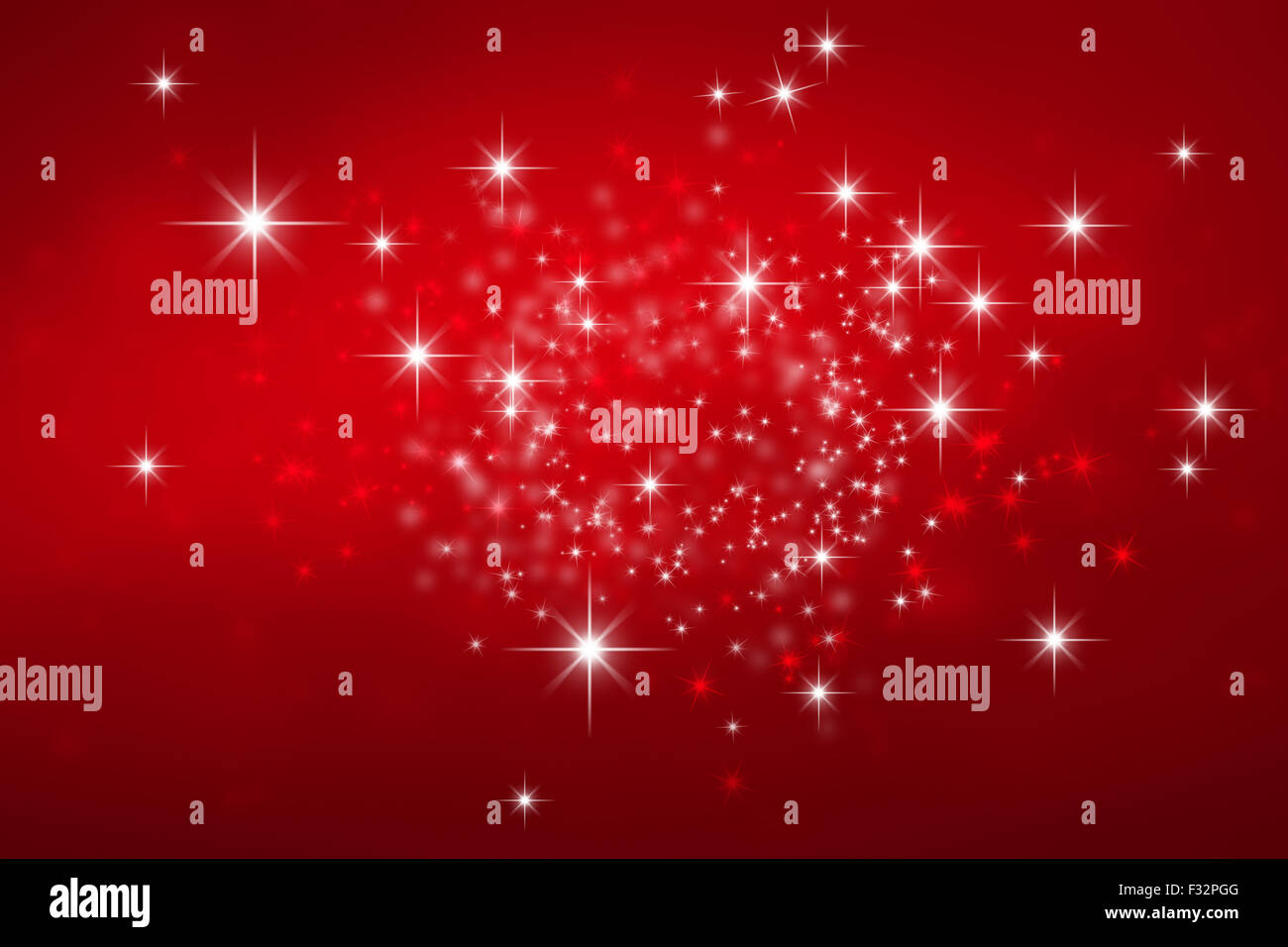 Noël arrière-plan rouge brillant avec star lights explosion Banque D'Images