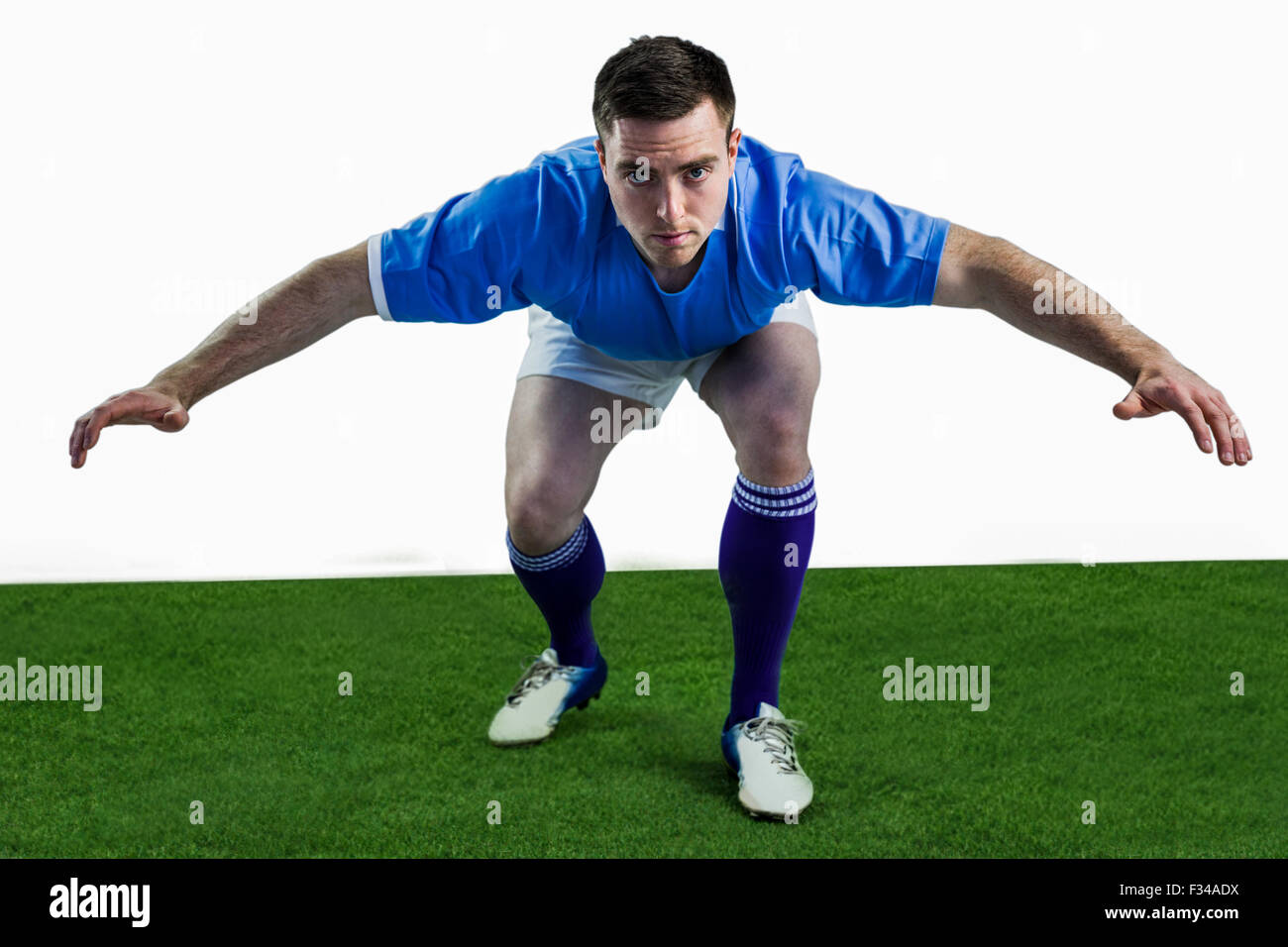 Rugby player prêt à s'attaquer à l'adversaire Banque D'Images