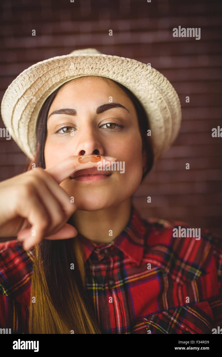 Belle hipster avec moustache sur le doigt Banque D'Images