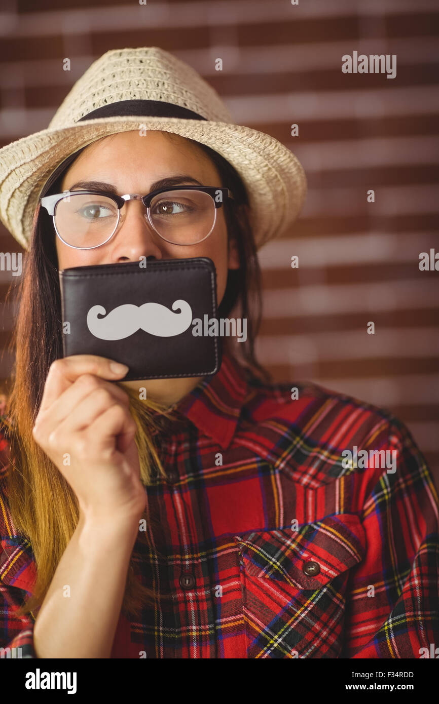 Belle hipster avec moustache sur wallet Banque D'Images