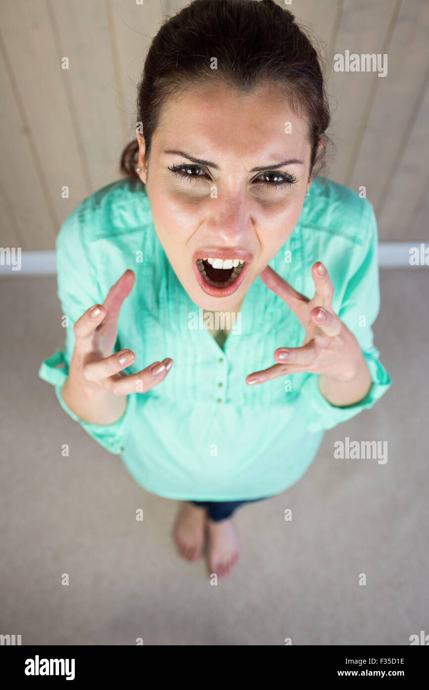 High angle portrait de screaming woman gesturing Banque D'Images