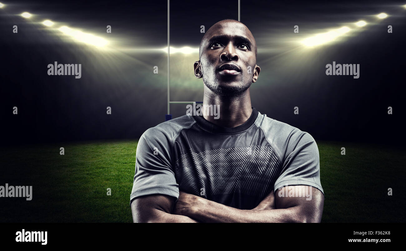 Composite image rugby player with arms crossed Banque D'Images