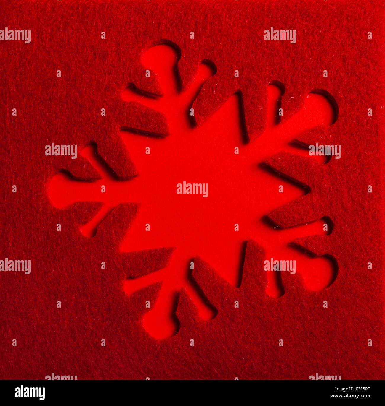 Flocon de neige de Noël sur fond rouge Banque D'Images