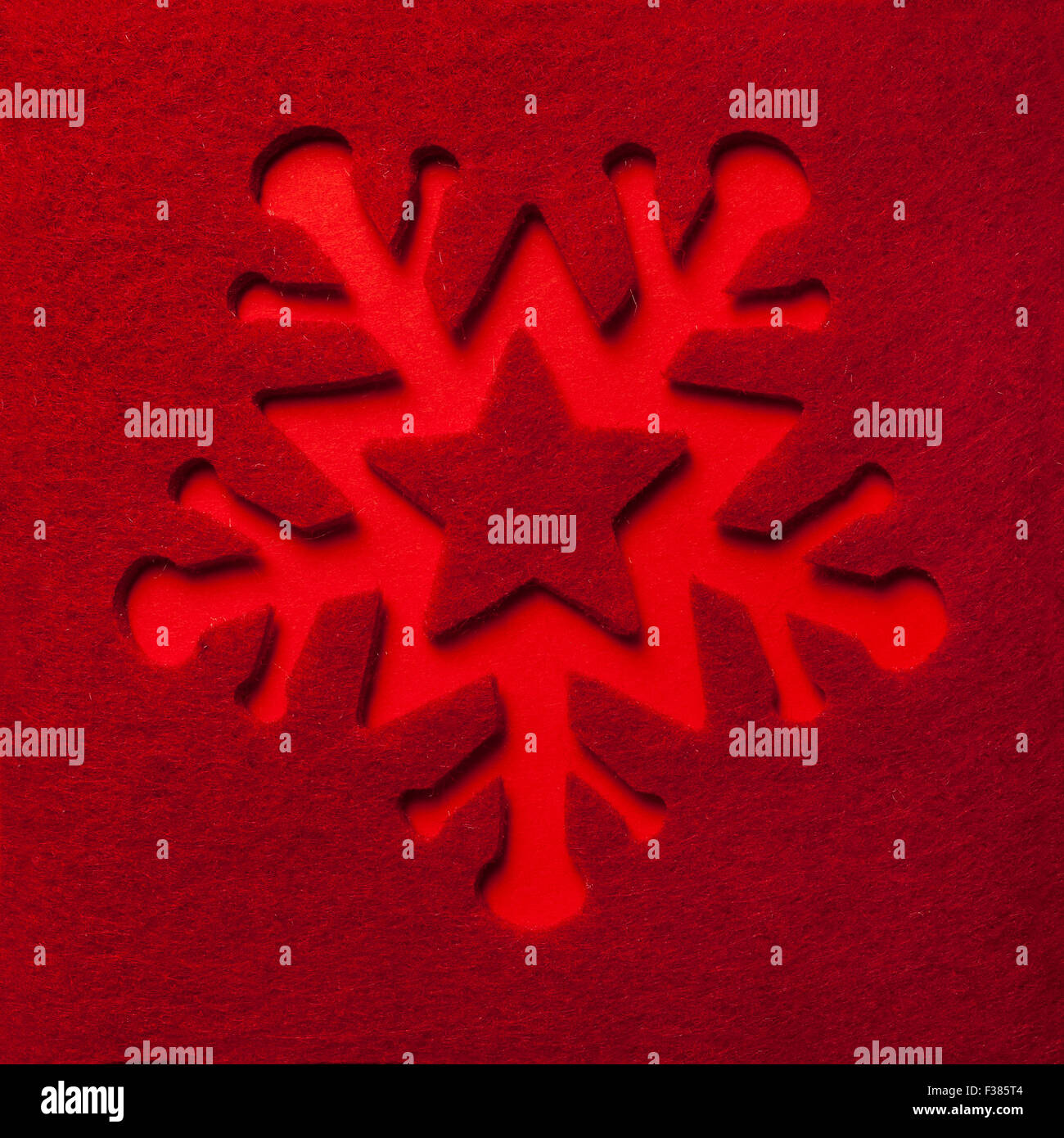 Flocon de neige de Noël sur fond rouge Banque D'Images