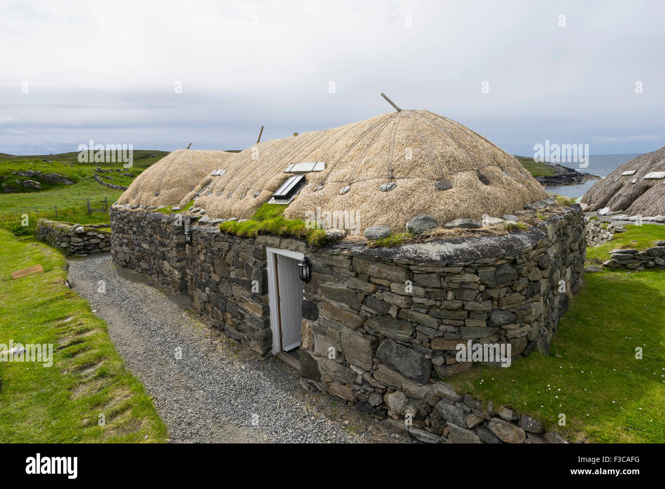 Cottage traditionnel à Gearrannan Blackhouse Blackhouse Village sur l'île de Lewis dans les Hébrides extérieures en Écosse United Kingdom Banque D'Images