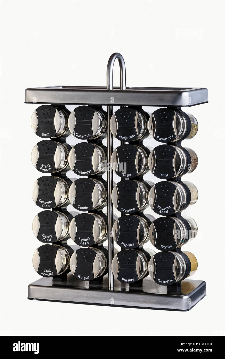 Collection de pots d'épices dans un rack en acier inoxydable. Banque D'Images