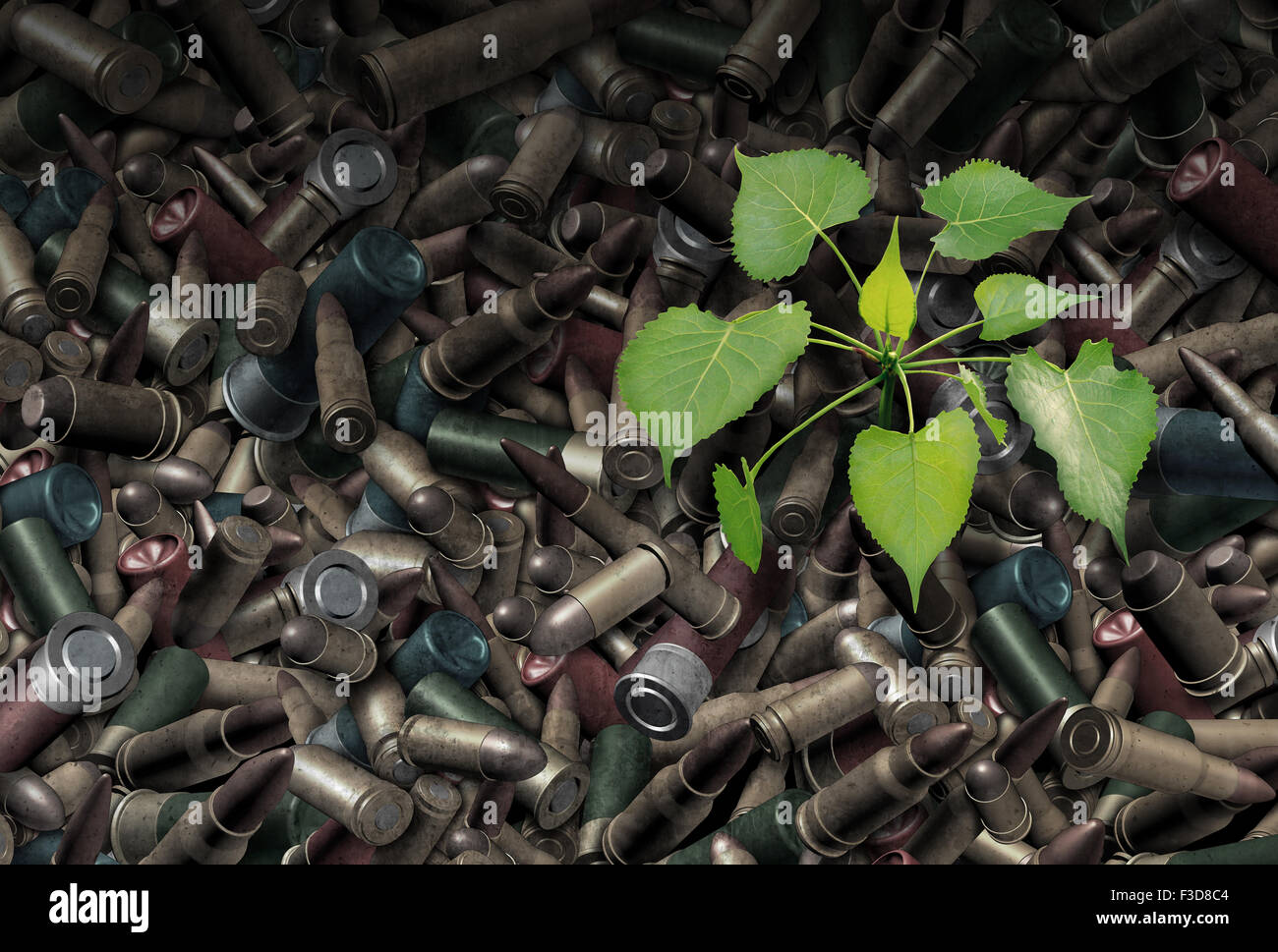 Concept d'après-guerre comme un arrière-plan de balles rustique et de munition d'armes d'un jeune arbre vert de la germination des arbres Banque D'Images