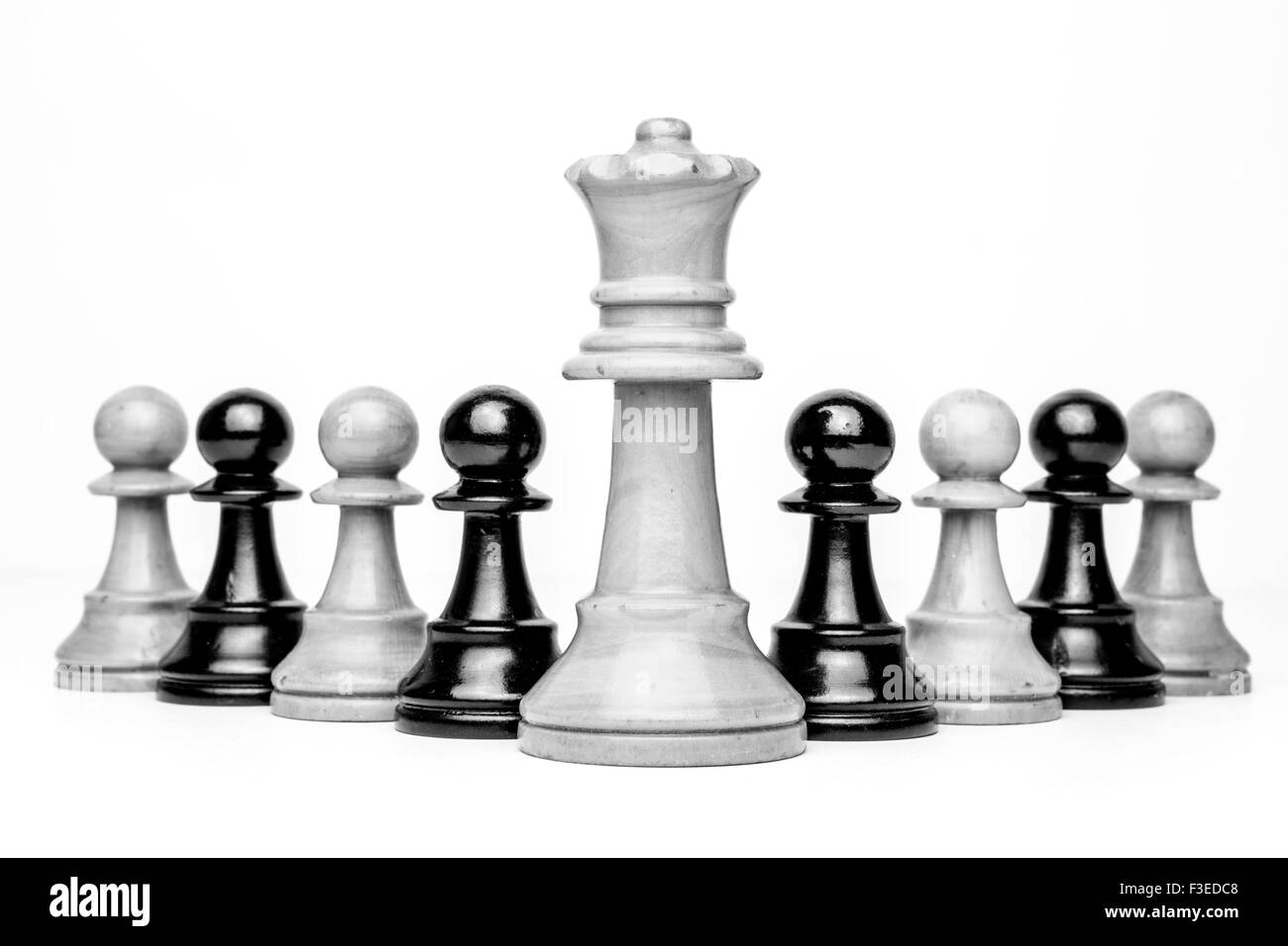 Reine et pions en monochrome Banque D'Images