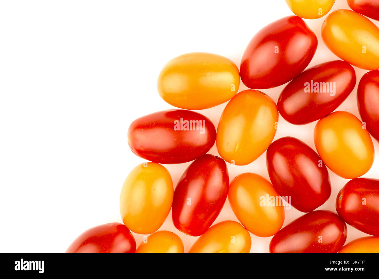 La texture de fond sain coloré rouge et or bio tomates raisins Banque D'Images