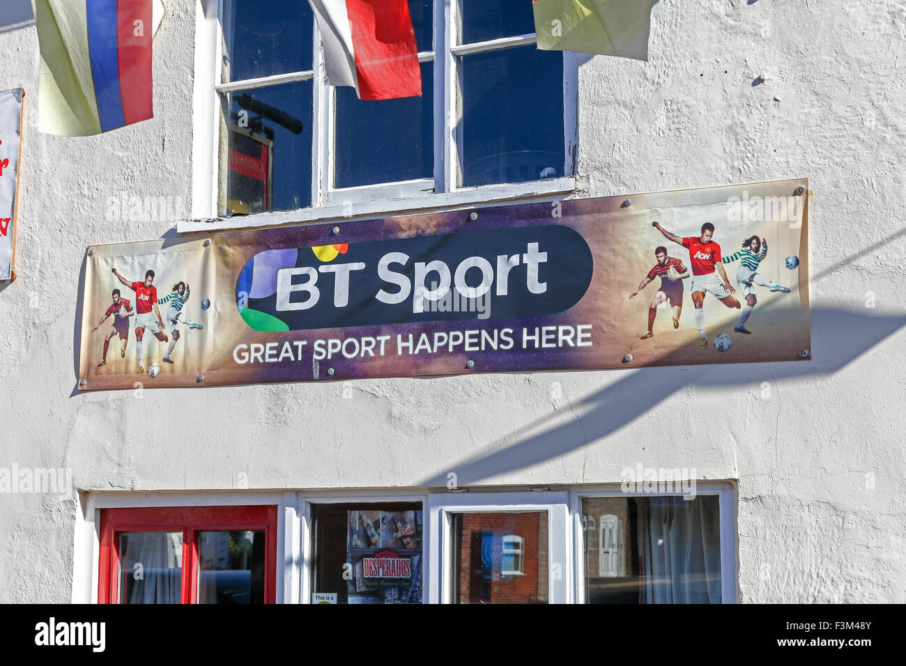 Un signe sur une pub ou public house disant bt sport illustré ici Banque D'Images