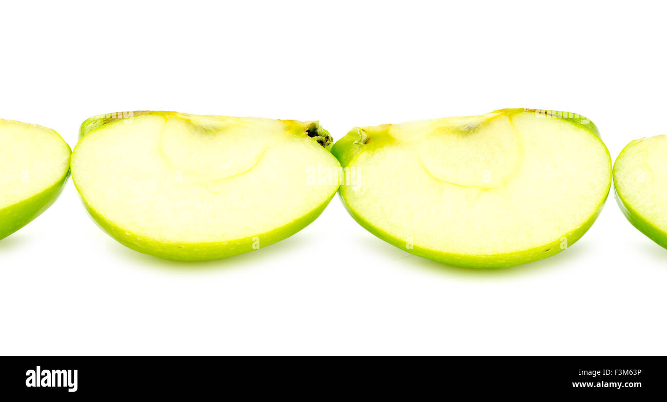 Ligne de pièces d'apple vert haché Banque D'Images