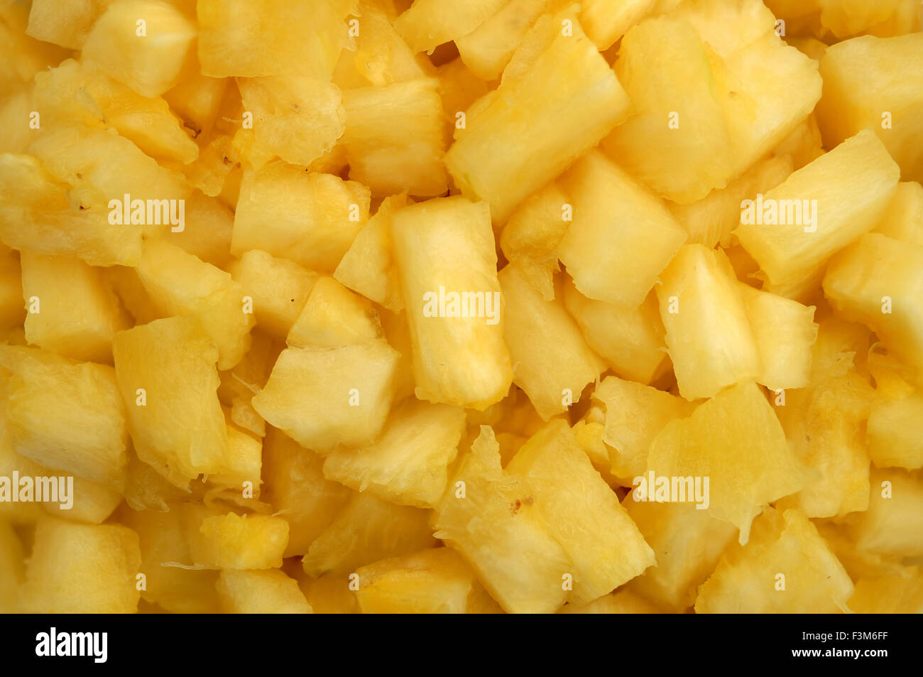 Close up plan macro sur l'ananas haché juteux. Banque D'Images