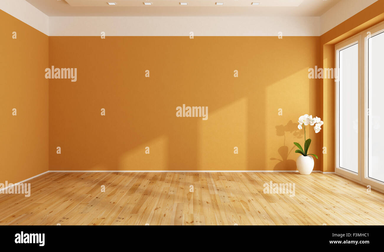 Chambre orange vide avec plancher en bois de rendu 3D Banque D'Images