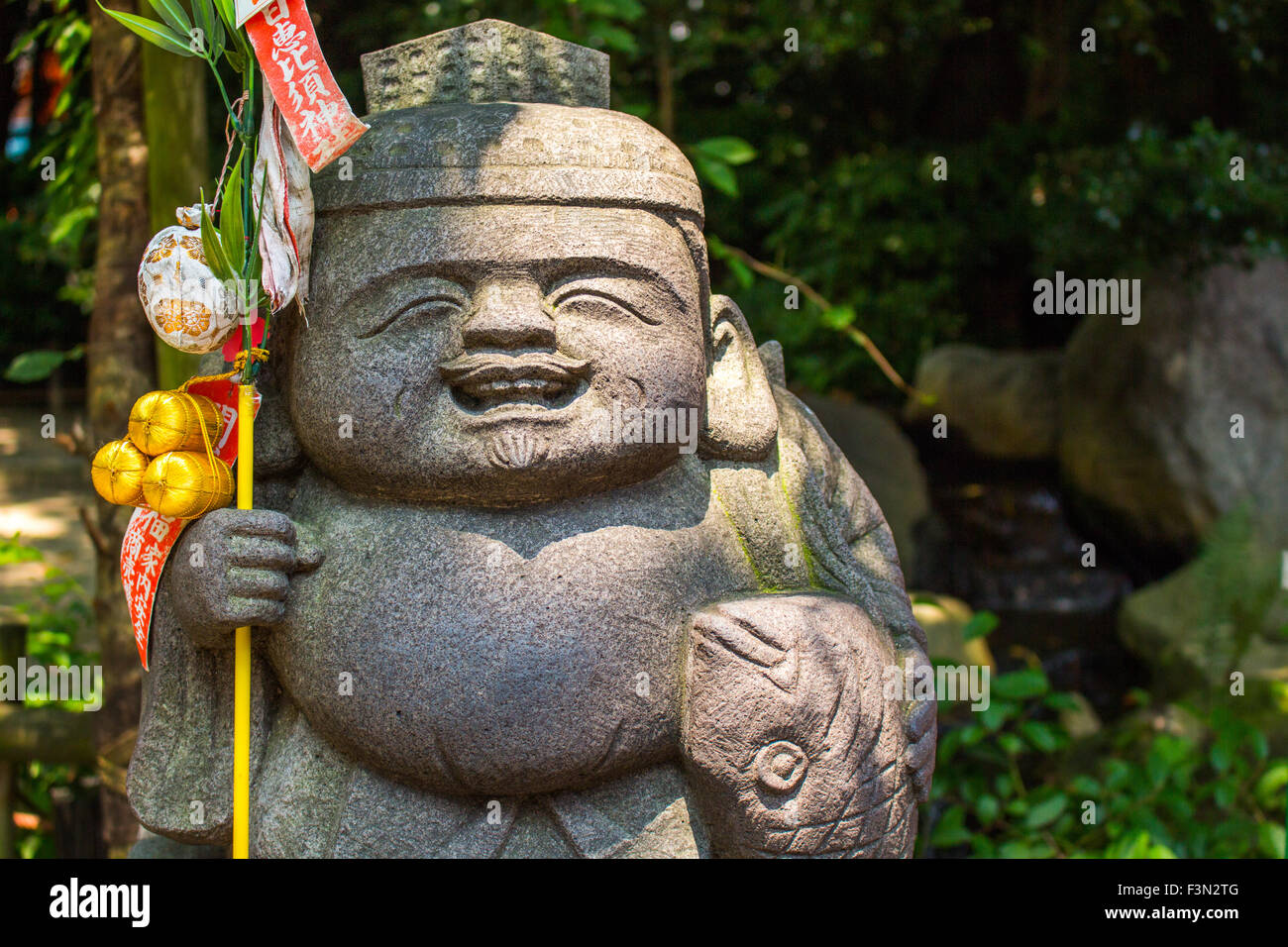 Idole de pierre japonais de sanctuaire de sumiyoshi à Fukuoka, Hakata. Ça représente la bonne chance Banque D'Images