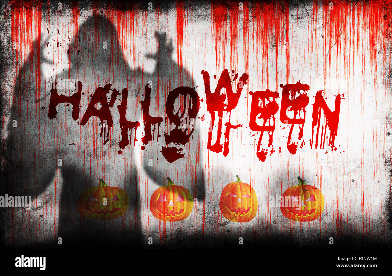 Vaporisé sur halloween sanglante d'un mur à côté de l'ombre d'un fantôme et le mal smiling pumpkins Banque D'Images