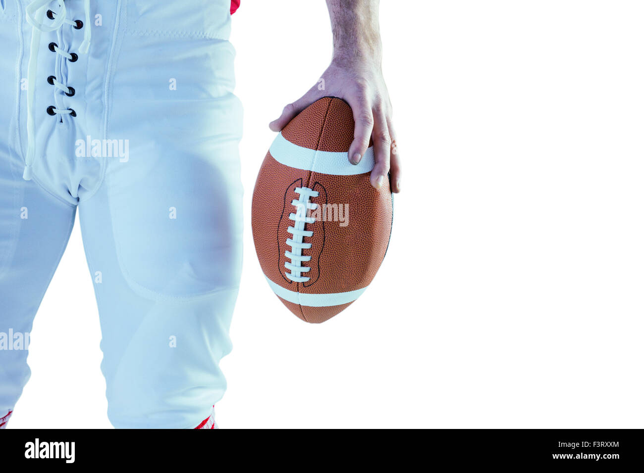 American football player holding football Banque D'Images