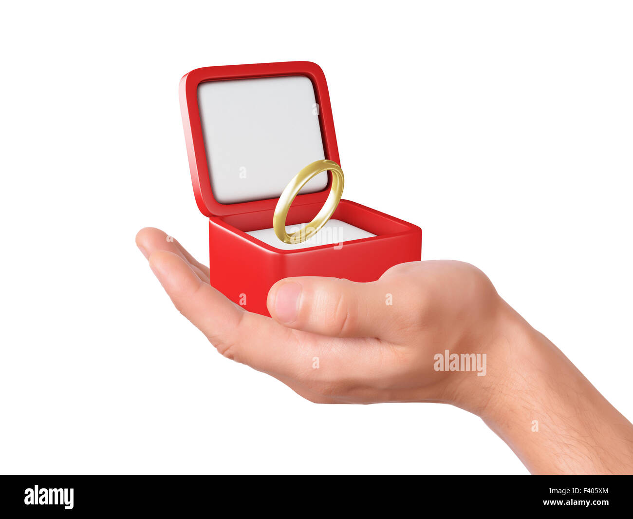 Tenir la main une boîte-cadeau avec anneau de mariage Banque D'Images