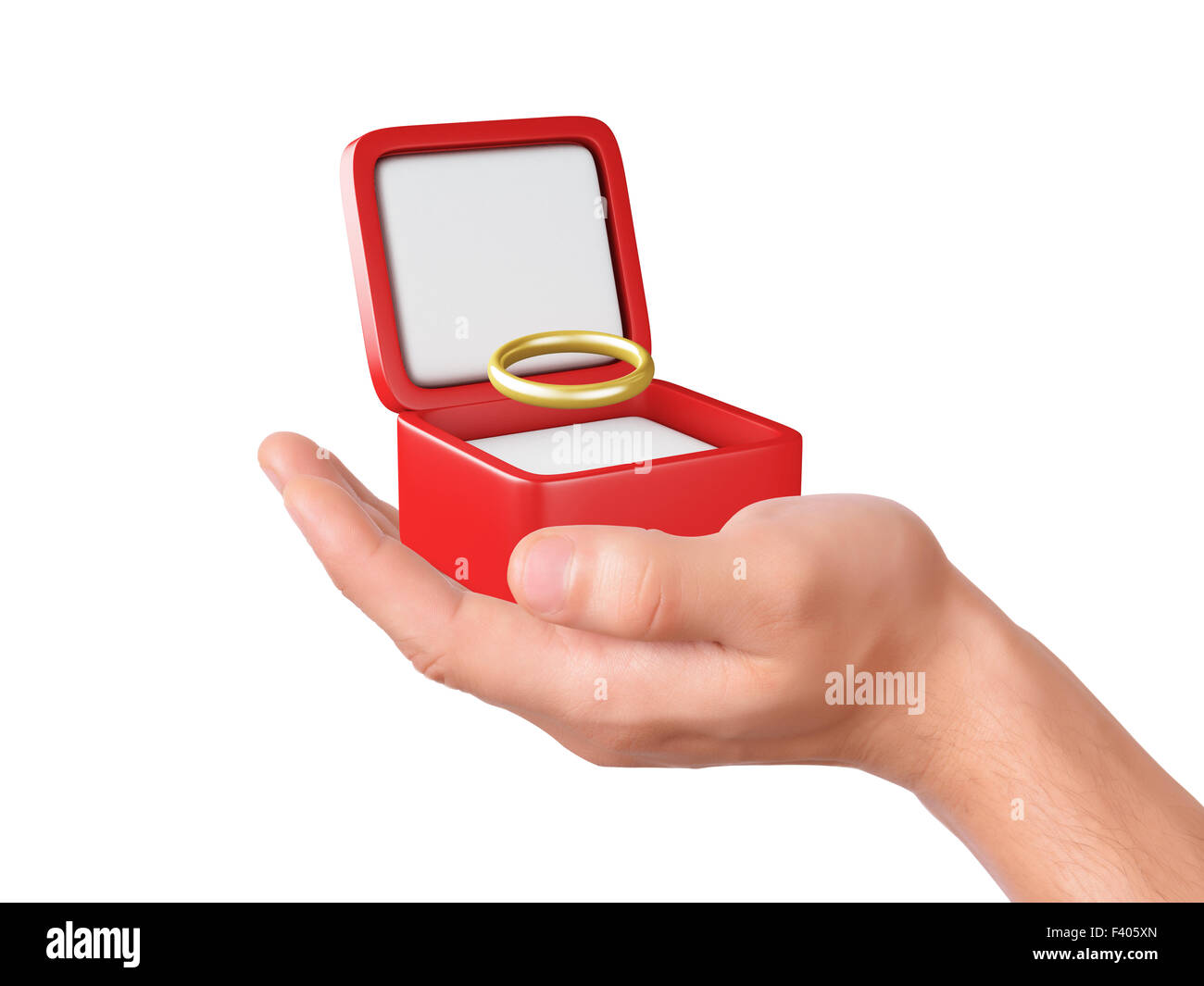Tenir la main une boîte-cadeau avec anneau de mariage Banque D'Images