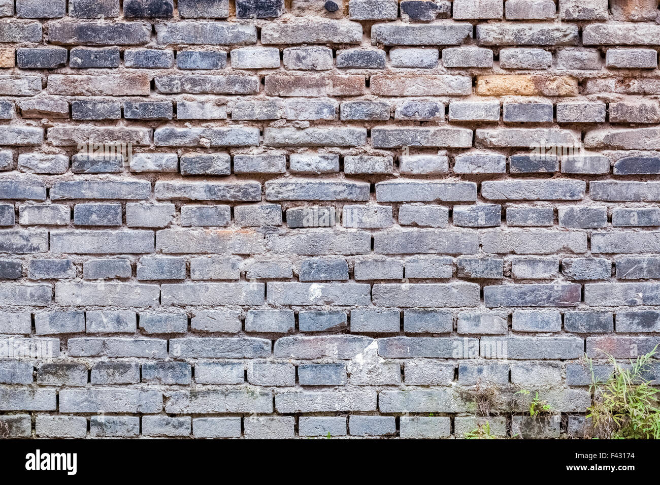 Vieux Mur de brique gris Banque D'Images