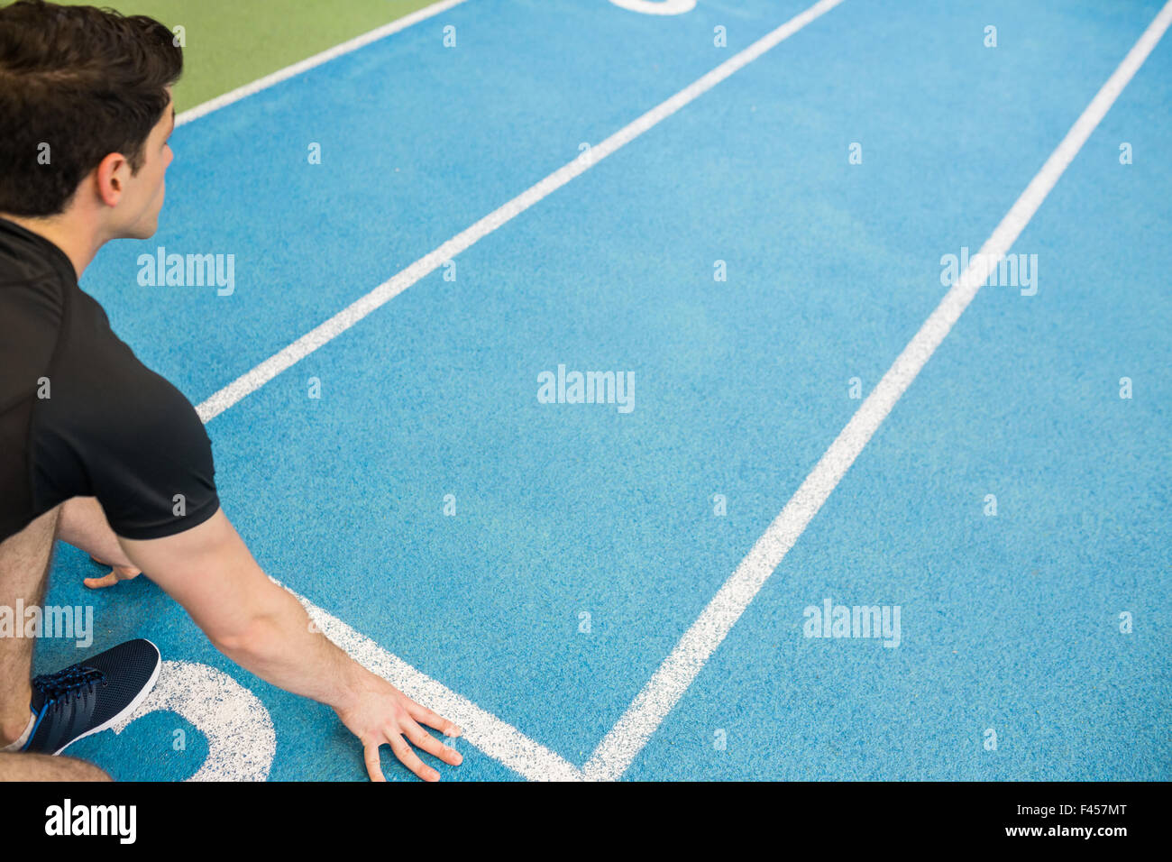 Mettre en place l'homme sur la ligne de départ Banque D'Images